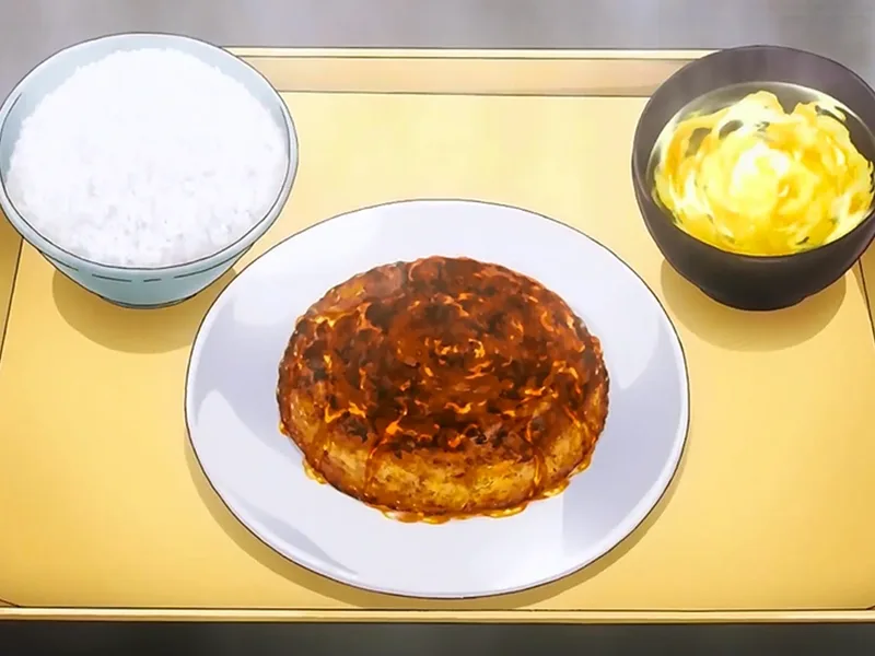 Mackerel burger meal with rice and egg soup on a serving tray